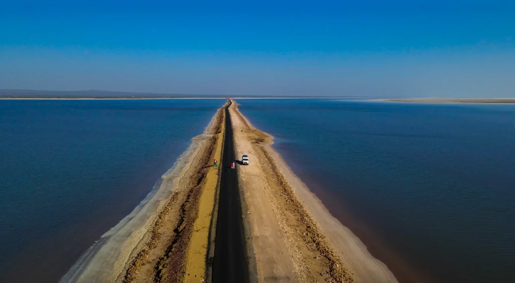 Road to Heaven — The scenic highway cutting straight through the white salt flats